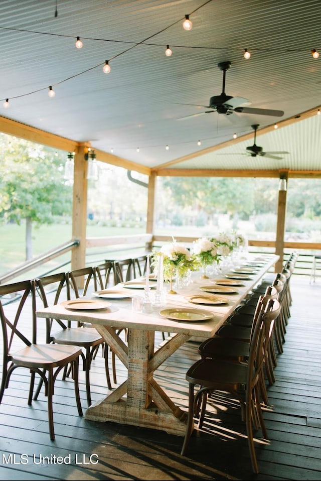 exterior space featuring vaulted ceiling