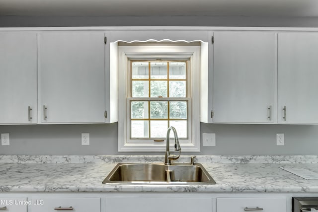 5887 Scotland Rd, Bentonia, MS 39040 - kitchen with a sink, light countertops, and white cabinets