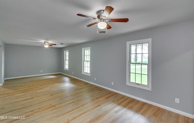 5887 Scotland Rd, Bentonia, MS 39040 - spare room with ceiling fan, baseboards, and light wood finished floors