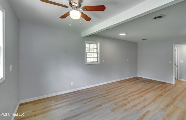 5887 Scotland Rd, Bentonia, MS 39040 - spare room featuring baseboards, light wood finished floors, and a ceiling fan