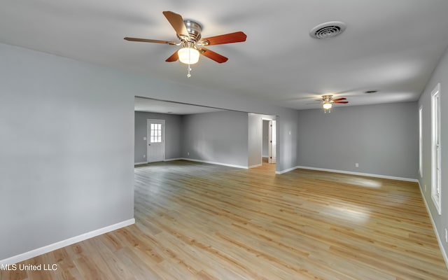 5887 Scotland Rd, Bentonia, MS 39040 - unfurnished room featuring ceiling fan, baseboards, and light wood-style flooring