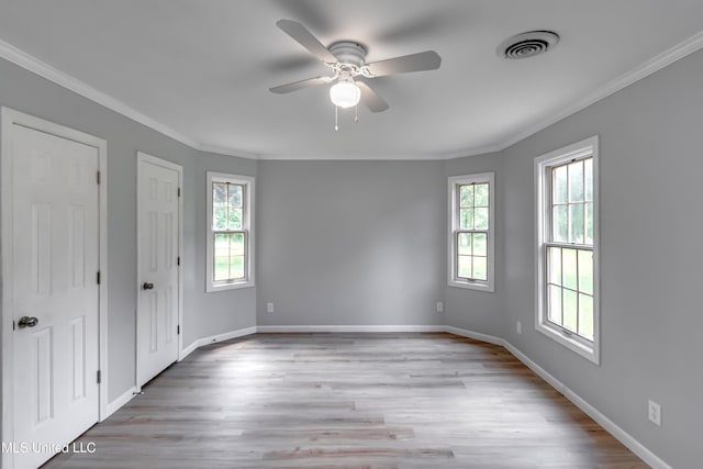 5887 Scotland Rd, Bentonia, MS 39040 - empty room featuring ceiling fan, crown molding, light wood-type flooring, and baseboards
