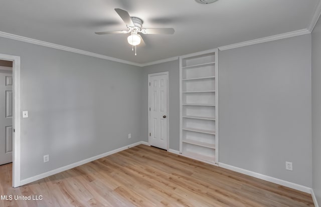 5887 Scotland Rd, Bentonia, MS 39040 - unfurnished bedroom featuring baseboards, wood finished floors, ornamental molding, and a ceiling fan