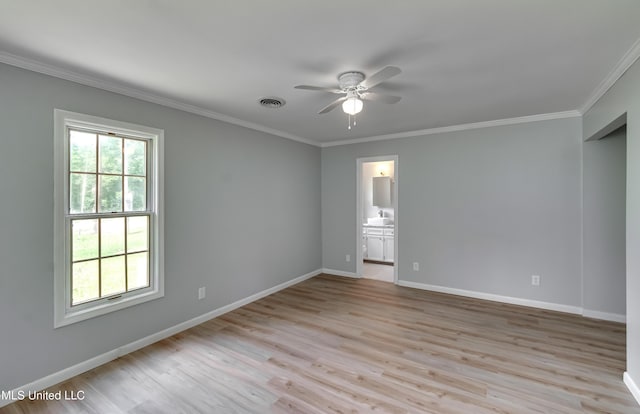 5887 Scotland Rd, Bentonia, MS 39040 - unfurnished room with ceiling fan, ornamental molding, light wood-style flooring, and baseboards