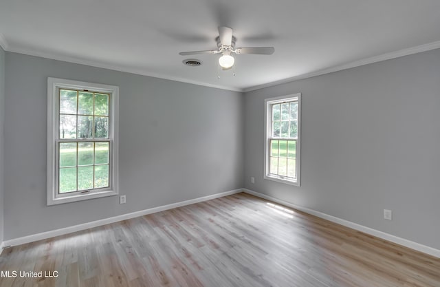 5887 Scotland Rd, Bentonia, MS 39040 - unfurnished room with ornamental molding, a ceiling fan, baseboards, and wood finished floors
