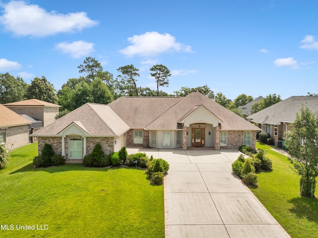 7528 Crooked Stick Dr, Diamondhead, MS 39525 - view of front of property featuring driveway, a front lawn, brick siding, and roof with shingles