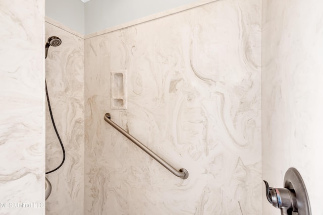 7528 Crooked Stick Dr, Diamondhead, MS 39525 - bathroom featuring a marble finish shower