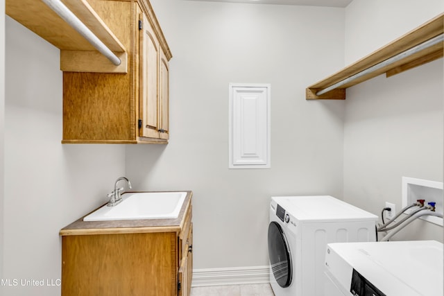 7528 Crooked Stick Dr, Diamondhead, MS 39525 - washroom with cabinet space and washing machine and dryer