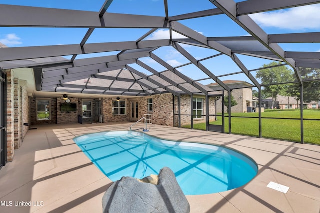 7528 Crooked Stick Dr, Diamondhead, MS 39525 - outdoor pool featuring a patio area, a ceiling fan, a yard, and glass enclosure