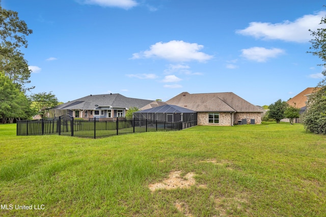 7528 Crooked Stick Dr, Diamondhead, MS 39525 - view of yard featuring a lanai