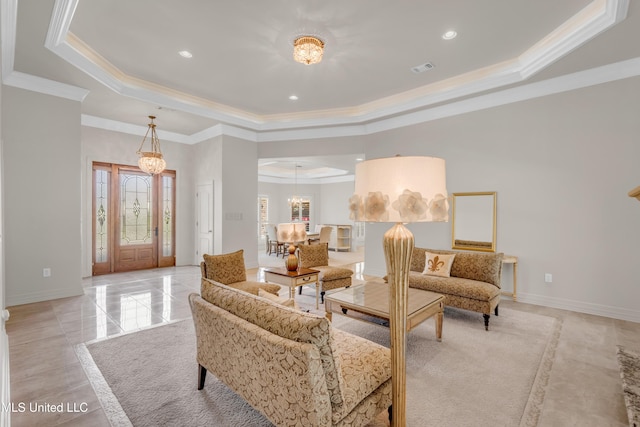 7528 Crooked Stick Dr, Diamondhead, MS 39525 - living area featuring a tray ceiling, crown molding, recessed lighting, a chandelier, and inlaid floor details