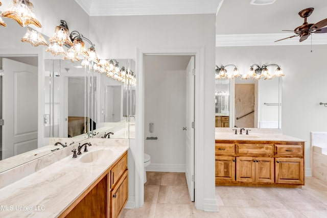 7528 Crooked Stick Dr, Diamondhead, MS 39525 - bathroom with a ceiling fan, two vanities, crown molding, tile patterned floors, and a chandelier