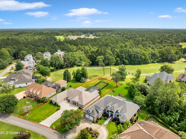7528 Crooked Stick Dr, Diamondhead, MS 39525 - aerial view of residential area featuring a heavily wooded area and property parcel outlined