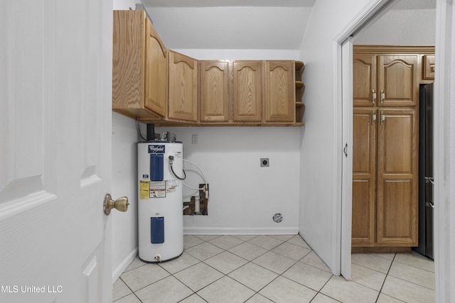 laundry area featuring cabinets, light tile patterned floors, water heater, and hookup for an electric dryer