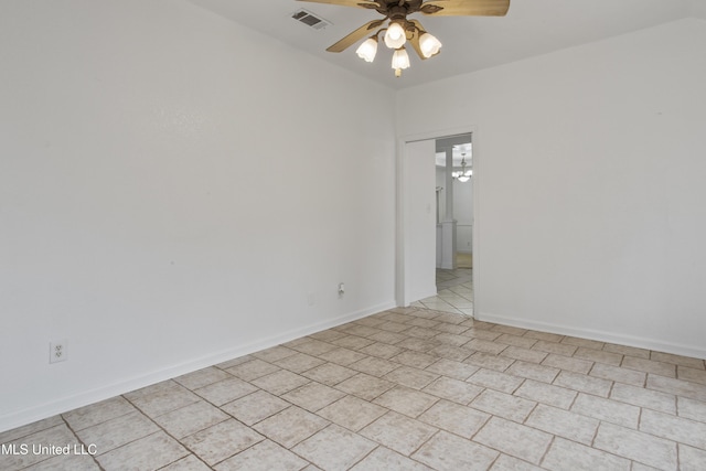 spare room with ceiling fan