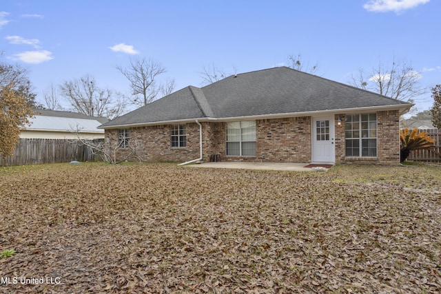 rear view of property featuring a patio