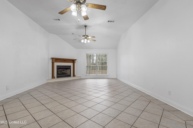 unfurnished living room featuring a fireplace, ceiling fan, and vaulted ceiling