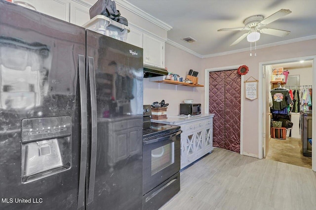 560 Bailey St, Mendenhall, MS 39114 - kitchen with black appliances, white cabinetry, light wood-style flooring, a ceiling fan, and ornamental molding
