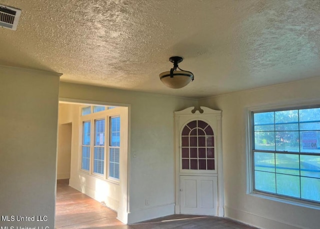 view of exterior entry with visible vents