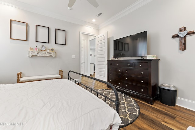 bedroom featuring ornamental molding, dark hardwood / wood-style floors, and ceiling fan