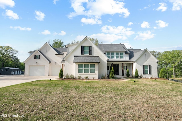 4270 Sunset Rd, Nesbit, MS 38651 - modern farmhouse featuring a porch, a front yard, a shingled roof, a garage, and driveway