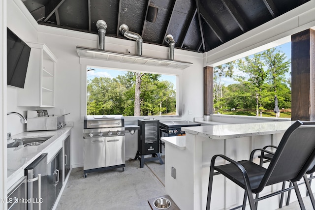 4270 Sunset Rd, Nesbit, MS 38651 - exterior space with concrete flooring, plenty of natural light, fridge, and a sink