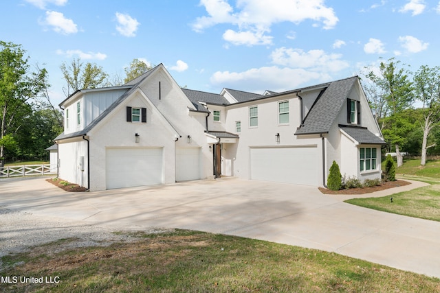 4270 Sunset Rd, Nesbit, MS 38651 - view of front of home with driveway, a garage, a shingled roof, and fence