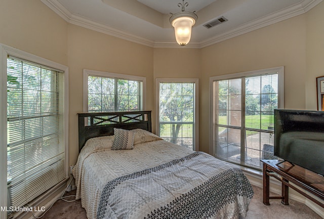 bedroom with multiple windows, carpet flooring, and crown molding