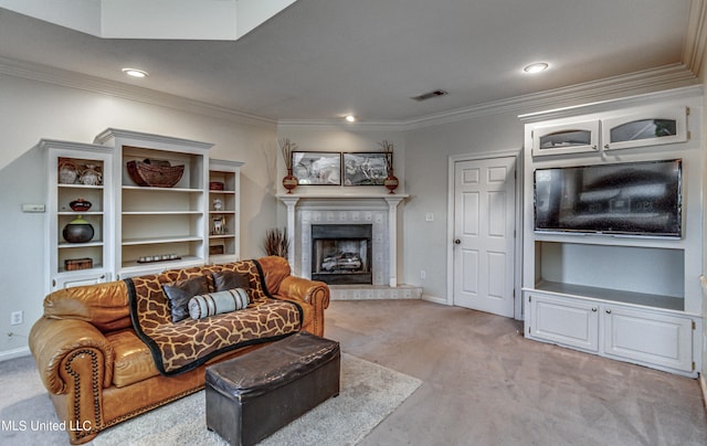 living room with a fireplace, visible vents, light colored carpet, and ornamental molding