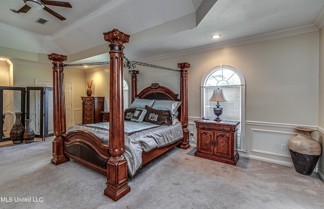 carpeted bedroom featuring decorative columns, recessed lighting, a wainscoted wall, and crown molding