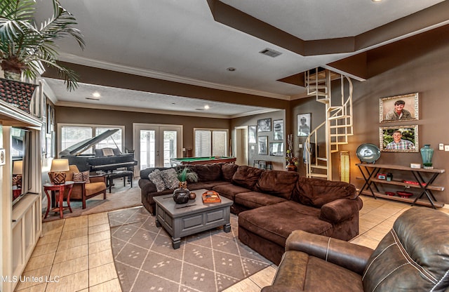 living room featuring pool table, french doors, light tile patterned flooring, and crown molding