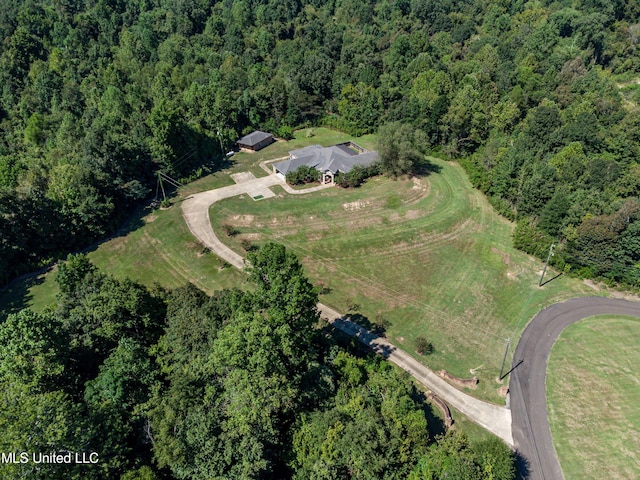 drone / aerial view with a forest view