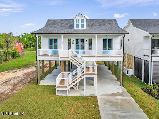 414 Shell St, Biloxi, MS 39530 - coastal home with a carport, driveway, french doors, a porch, and a shingled roof