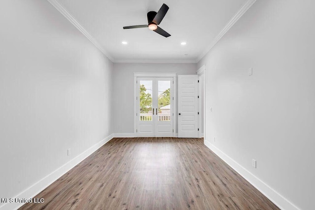 414 Shell St, Biloxi, MS 39530 - spare room with ornamental molding, baseboards, ceiling fan, wood finished floors, and recessed lighting