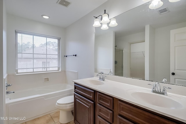 full bathroom featuring tile patterned floors, vanity, toilet, and shower with separate bathtub