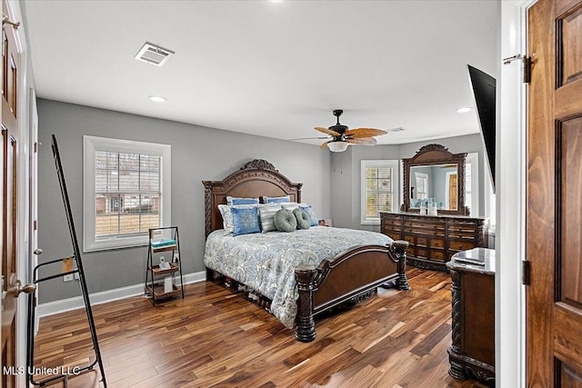 bedroom featuring hardwood / wood-style floors and ceiling fan