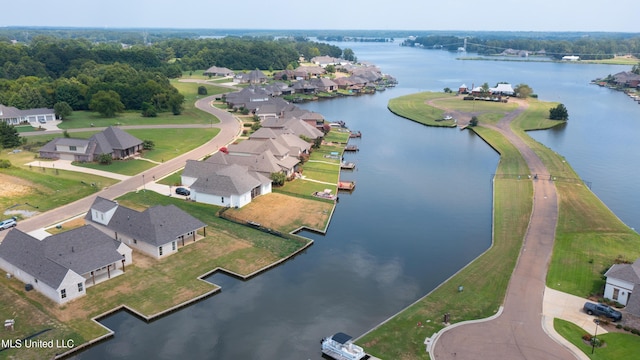 aerial view with a water view and a residential view