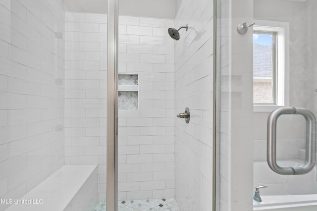 bathroom featuring a stall shower