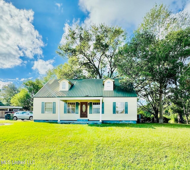 view of front of home with a front lawn