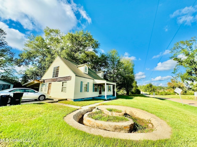 view of side of home featuring a yard