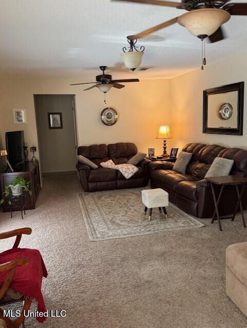 2246 Baywood Dr, Biloxi, MS 39532 - carpeted living room featuring a ceiling fan