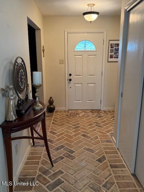 2246 Baywood Dr, Biloxi, MS 39532 - entrance foyer with brick floors and baseboards