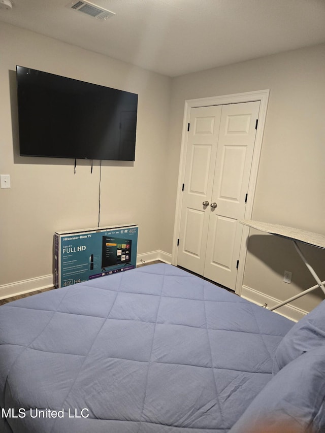 109 Brunswick Cv, Canton, MS 39046 - bedroom featuring baseboards and a closet