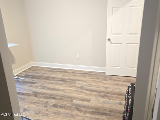 109 Brunswick Cv, Canton, MS 39046 - spare room featuring wood finished floors and baseboards