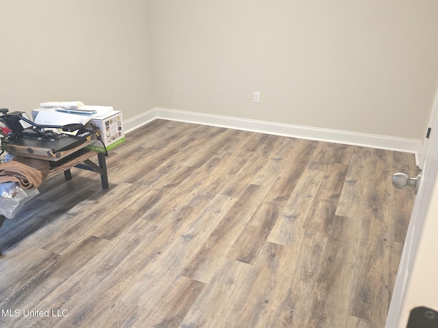 109 Brunswick Cv, Canton, MS 39046 - empty room featuring baseboards and wood finished floors