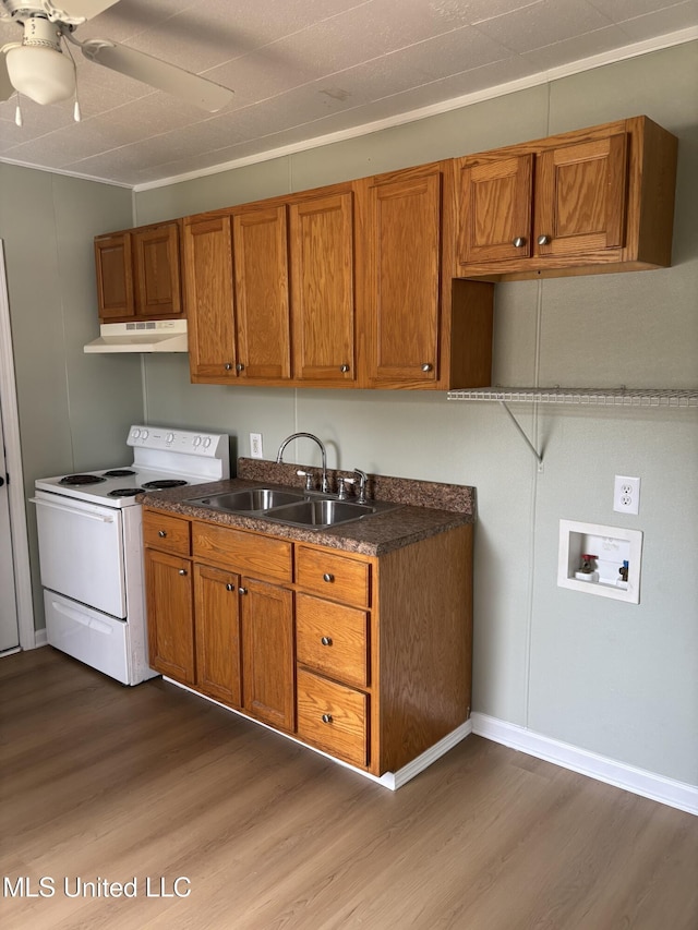 kitchen with dark hardwood / wood-style flooring, sink, ceiling fan, and white range with electric stovetop