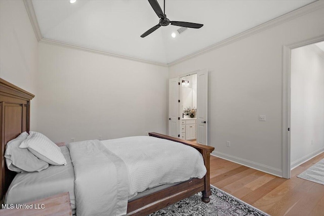 6603 Wirtz Rd, Flowood, MS 39232 - bedroom with light wood-style floors, ornamental molding, lofted ceiling, ensuite bathroom, and ceiling fan