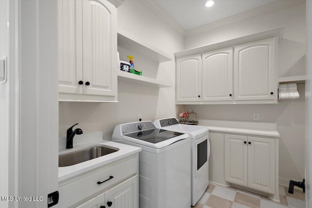 6603 Wirtz Rd, Flowood, MS 39232 - laundry area with washer and dryer, cabinet space, ornamental molding, and recessed lighting