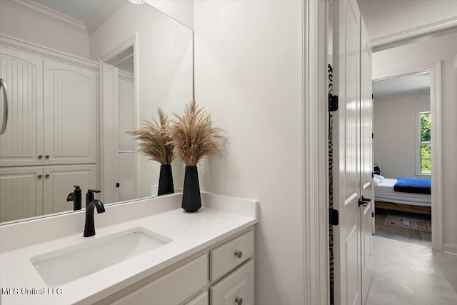 6603 Wirtz Rd, Flowood, MS 39232 - ensuite bathroom with vanity, ornamental molding, and tile patterned flooring