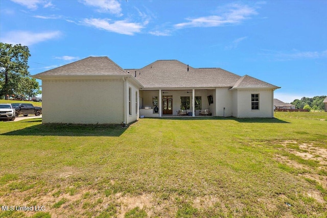 6603 Wirtz Rd, Flowood, MS 39232 - back of property featuring a lawn and stucco siding
